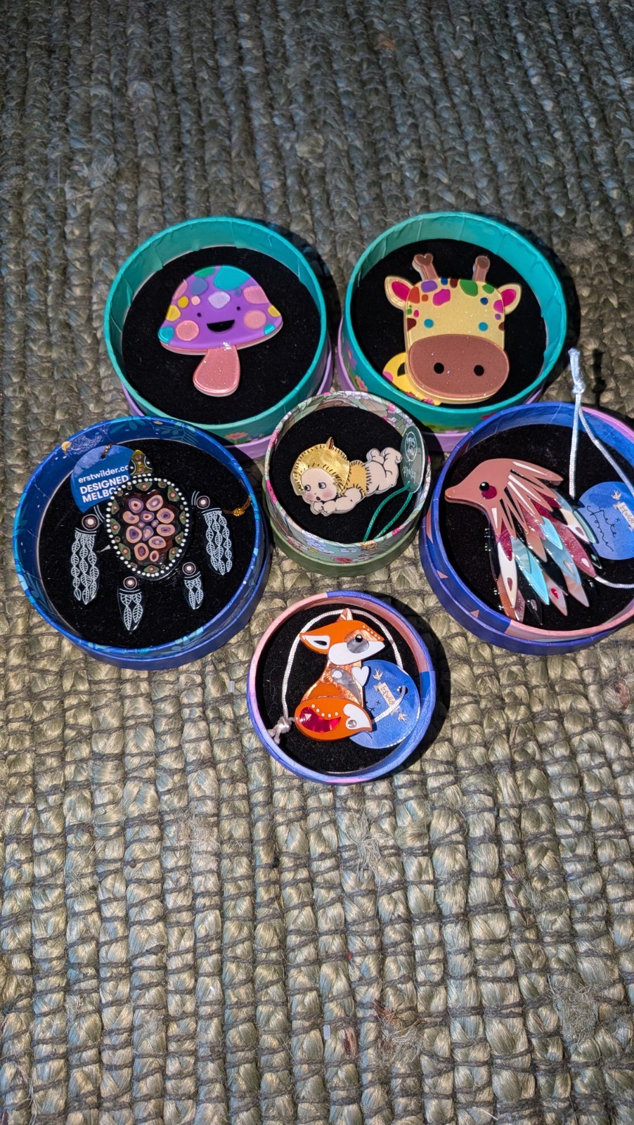 ERSTWILDER BROOCHES