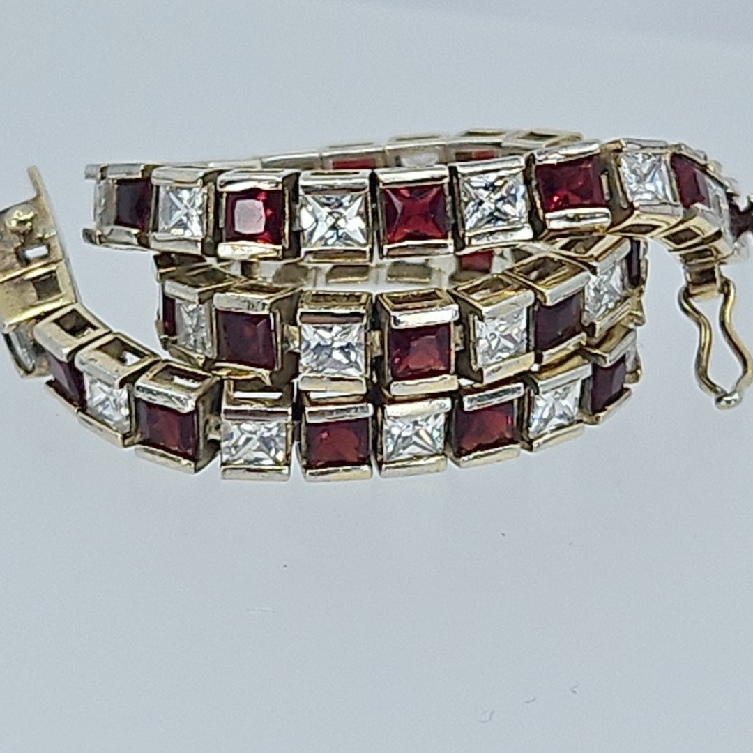 Ross Simons 7.5″ lab created Ruby CZ Tennis Bracelet Gold over Silver 925