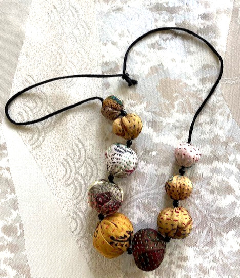 Multicolored fabric and cord adjustable necklace (14″ inch drop)