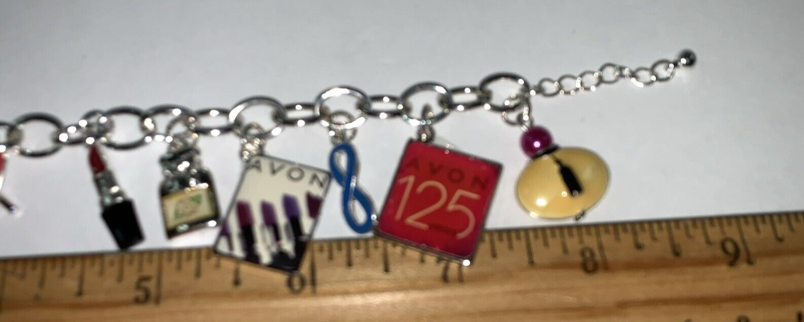 Avon 125th Anniversary Silver Tone Charm Bracelet NIB