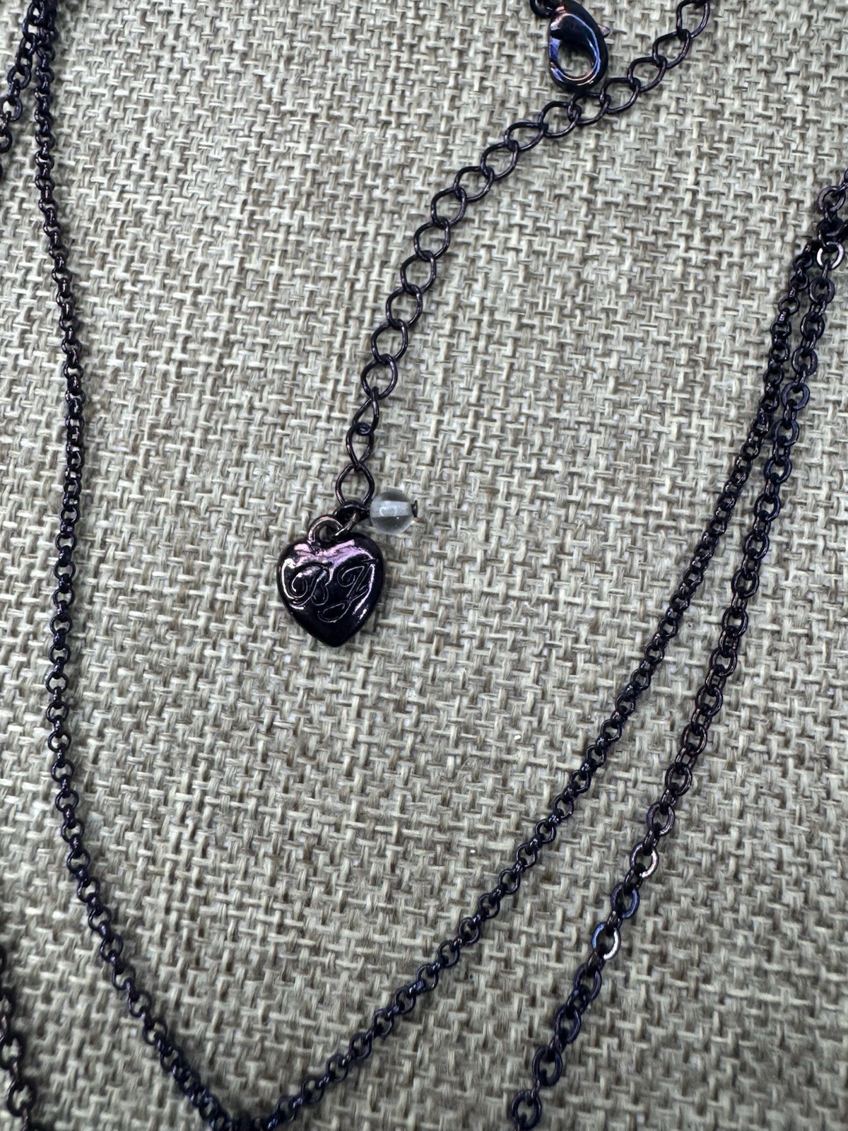 Betsey Johnson Layered Charm,purple/iridescent necklace 16”-19”