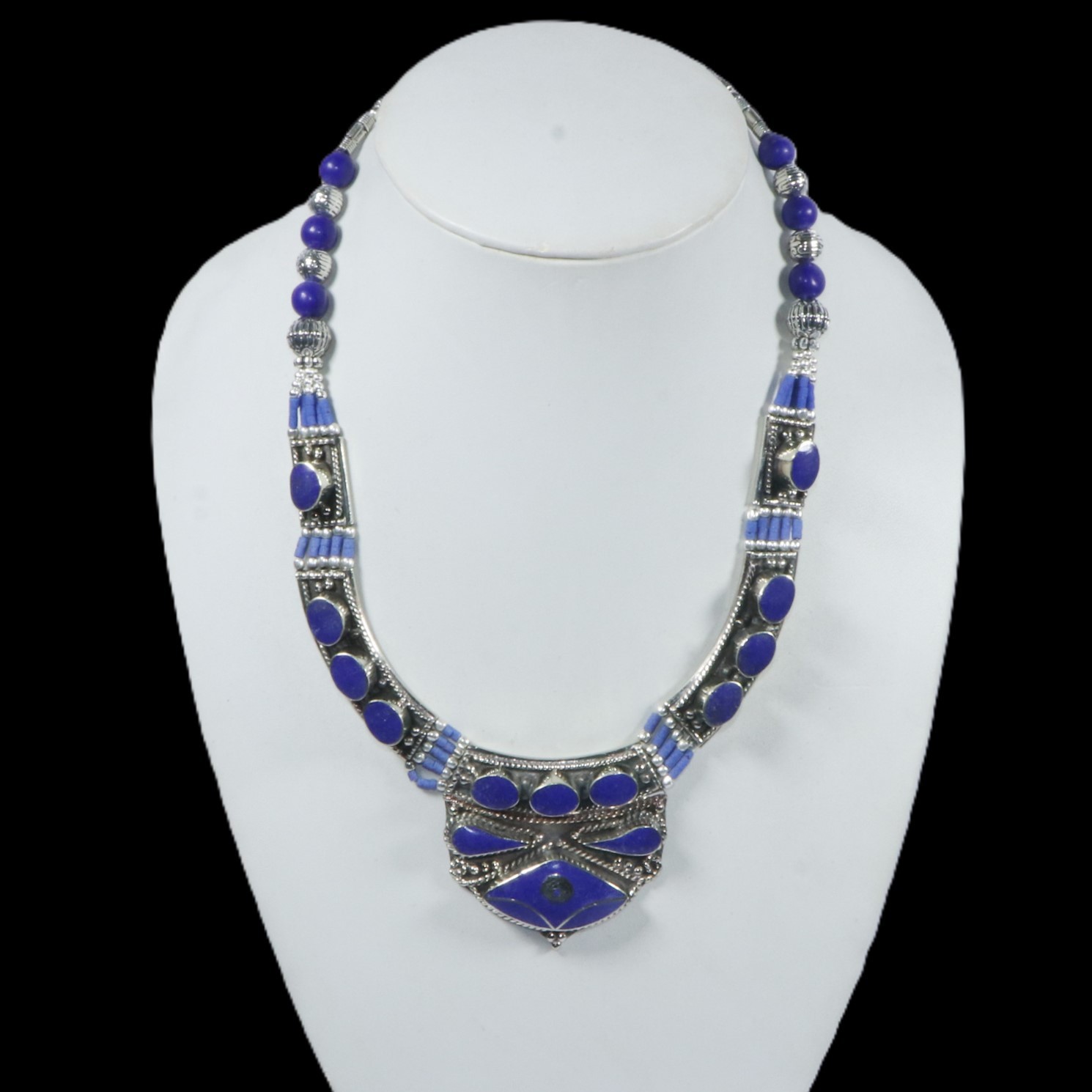 The ethnic statement necklace has a blue color design eye-clean gemstone jewelry