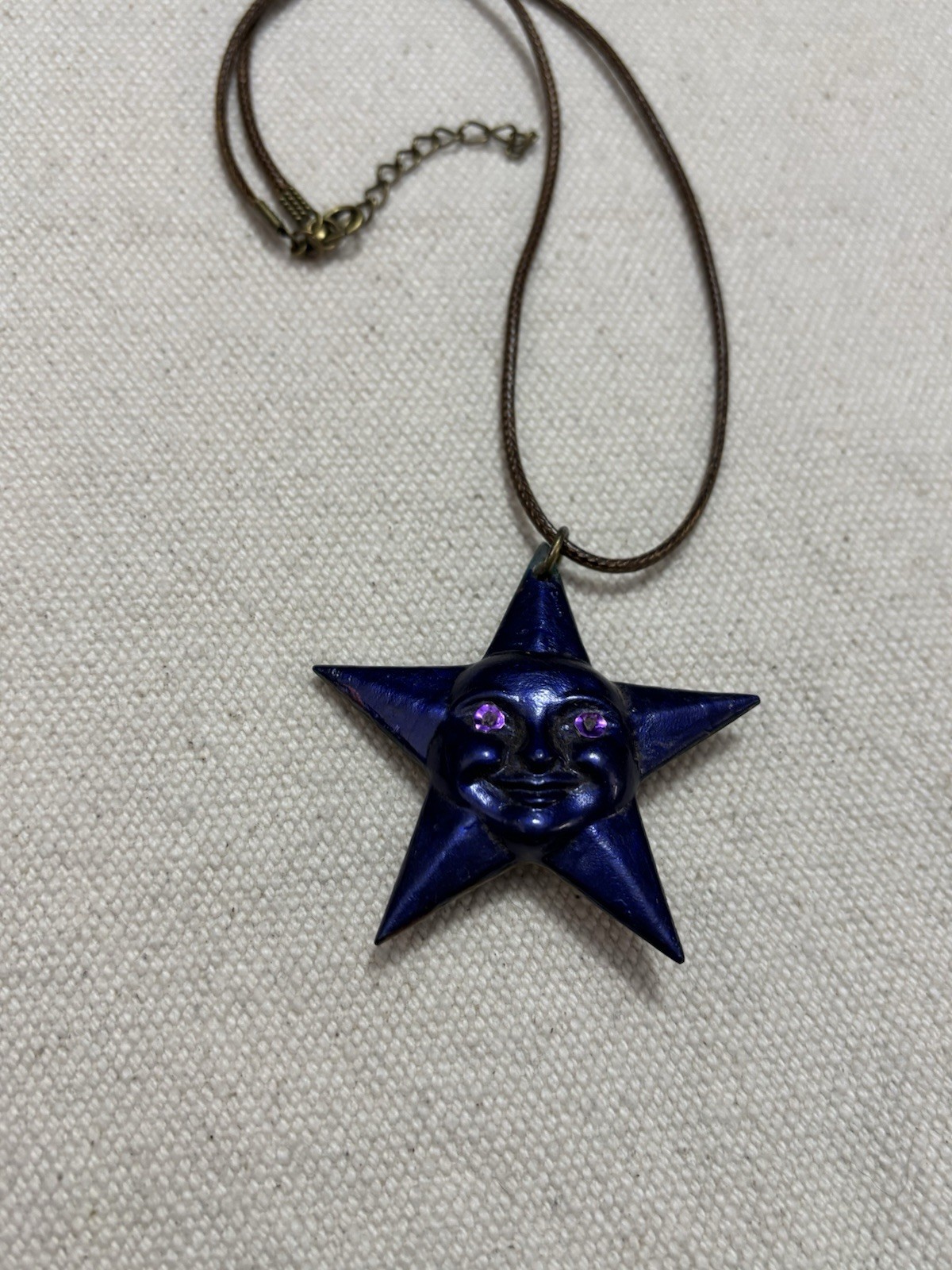 Star Moon double sided pendant on a cord necklace