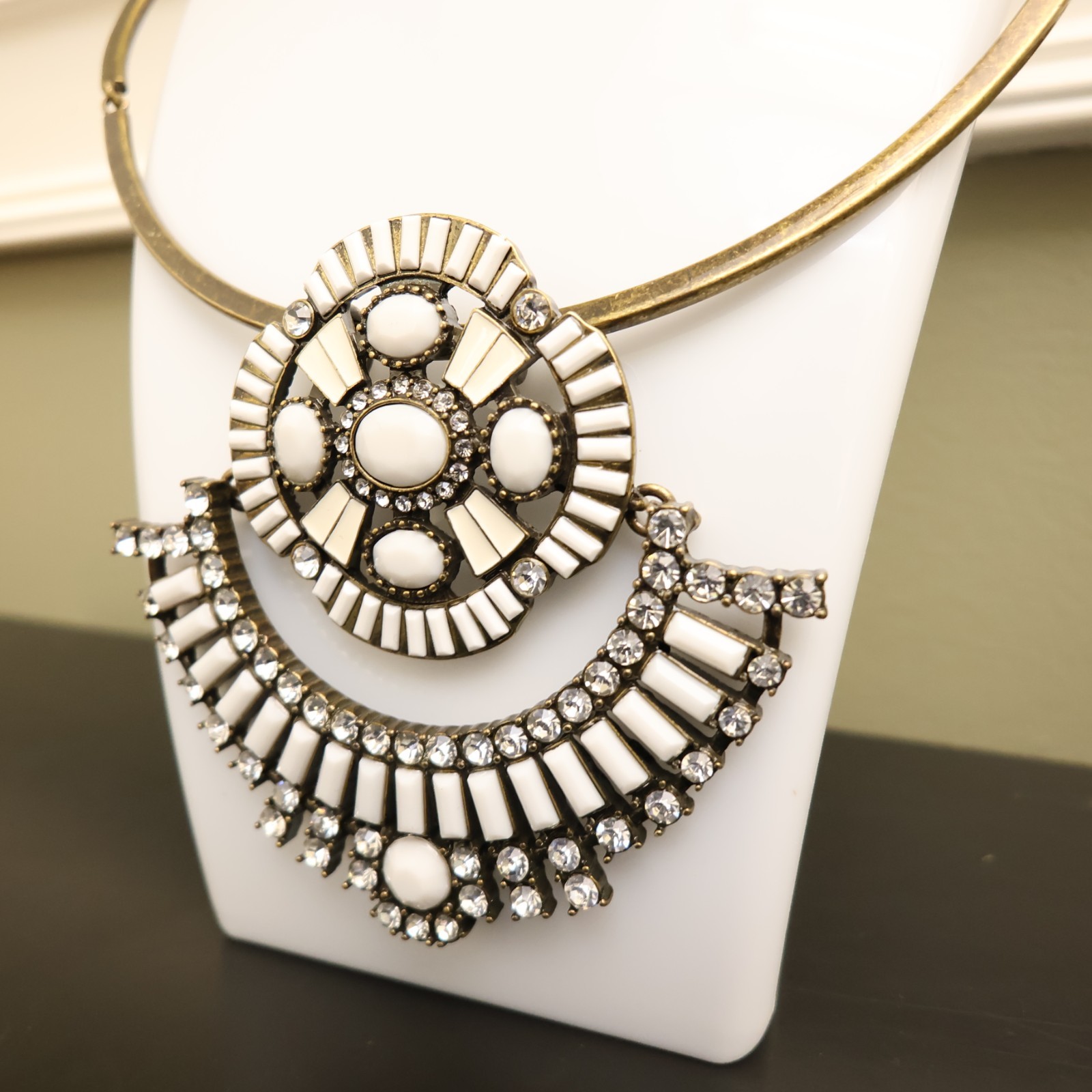 Logo Links necklace Lori Goldstein ivory crystals statement collar bronzetone