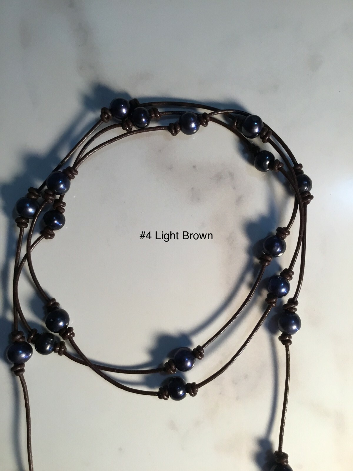 60″ Leather Black Pearl Necklace and 16″-19″ Adjustable Infinity Pearl Necklace