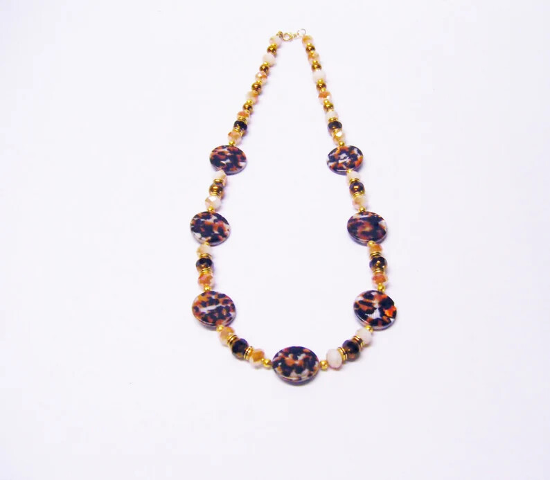 Black/Orange/White Cheetah Print Pattern Shell w/Gold/Brown Faceted Bead N/B/E