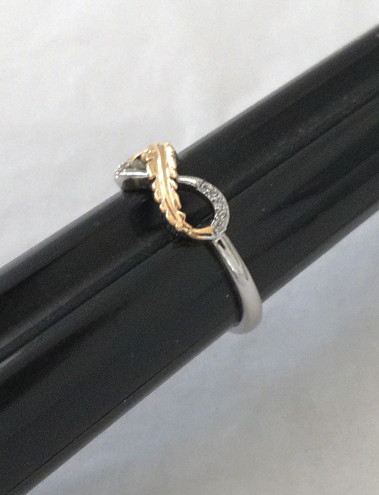 New Silvertone Eternal Infinity Loop with Goldtone Feather Accent Ring Size 7.75