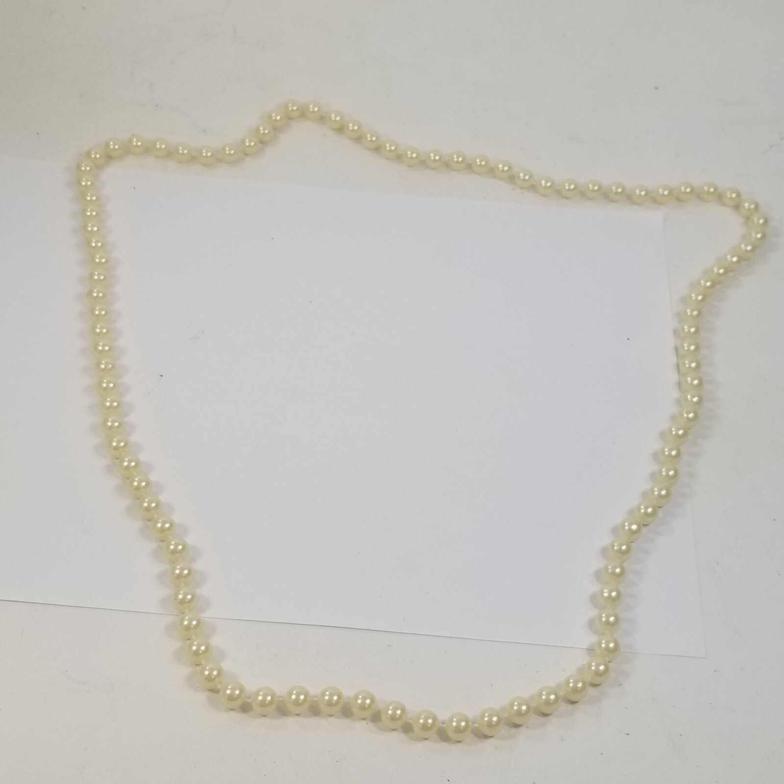 STRING OF FAUX PEARLS NECKLACE 36″ LONG