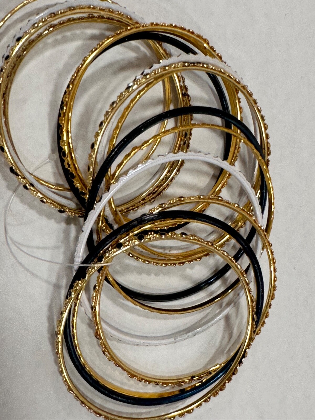 Lot of 17 Thin Gold, Silver, White & Black Tone Metal Bangle Bracelets
