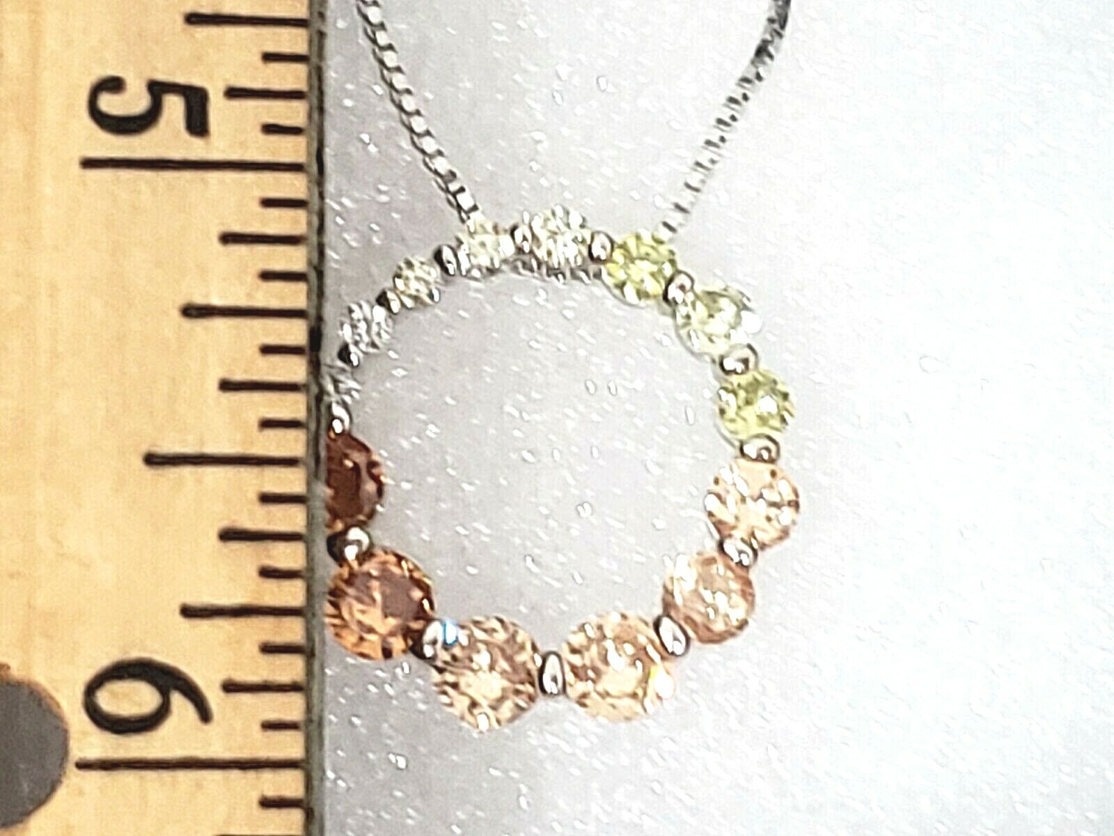 Multi colored Cubic Zircona circle pendant 8.70 tcw 18-20 in adj in Rhodium/925