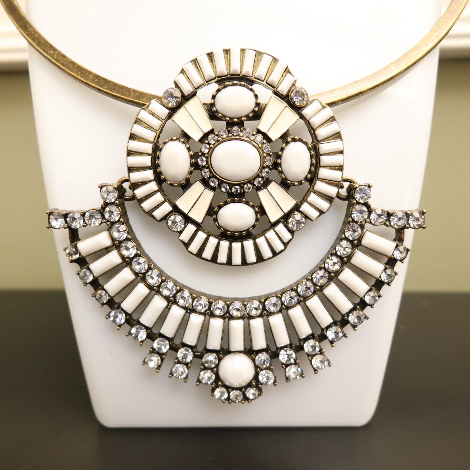 Logo Links necklace Lori Goldstein ivory crystals statement collar bronzetone