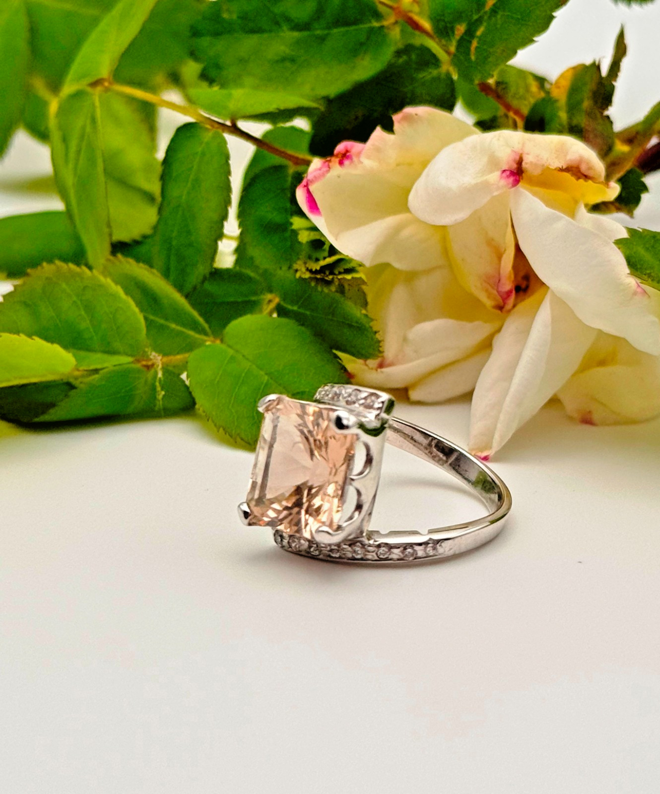 Emerald cut topaz paired with sparkling zircon, set in handcrafted 925