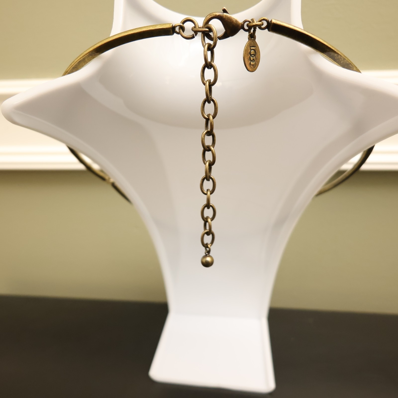 Logo Links necklace Lori Goldstein ivory crystals statement collar bronzetone