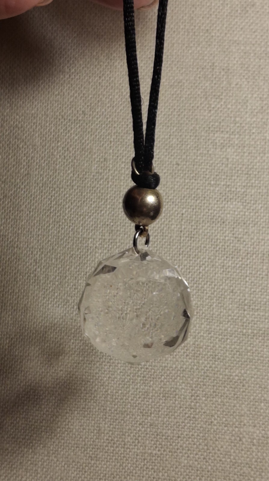 No brand glass or acrylic faceted clear ball w/black knotted cord necklace