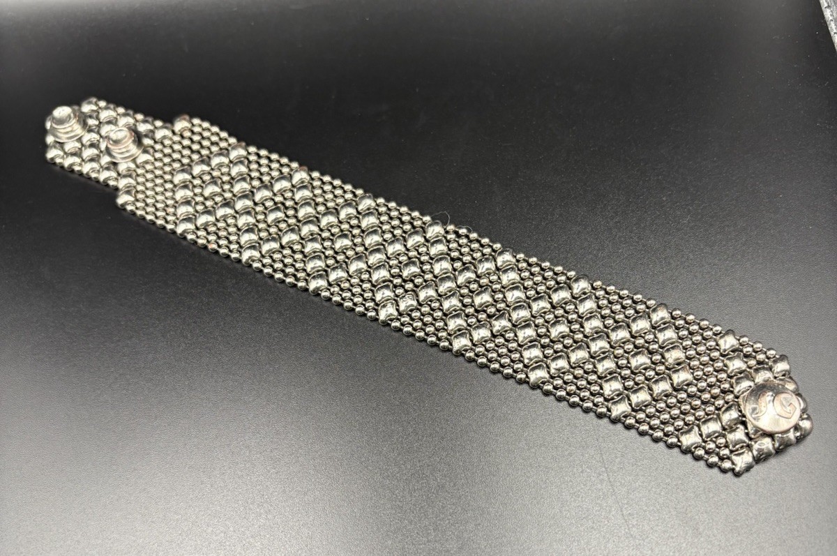Sergio Gutierrez Liquid Metal Bracelet Silver Tone Finish Snap Closure 8″