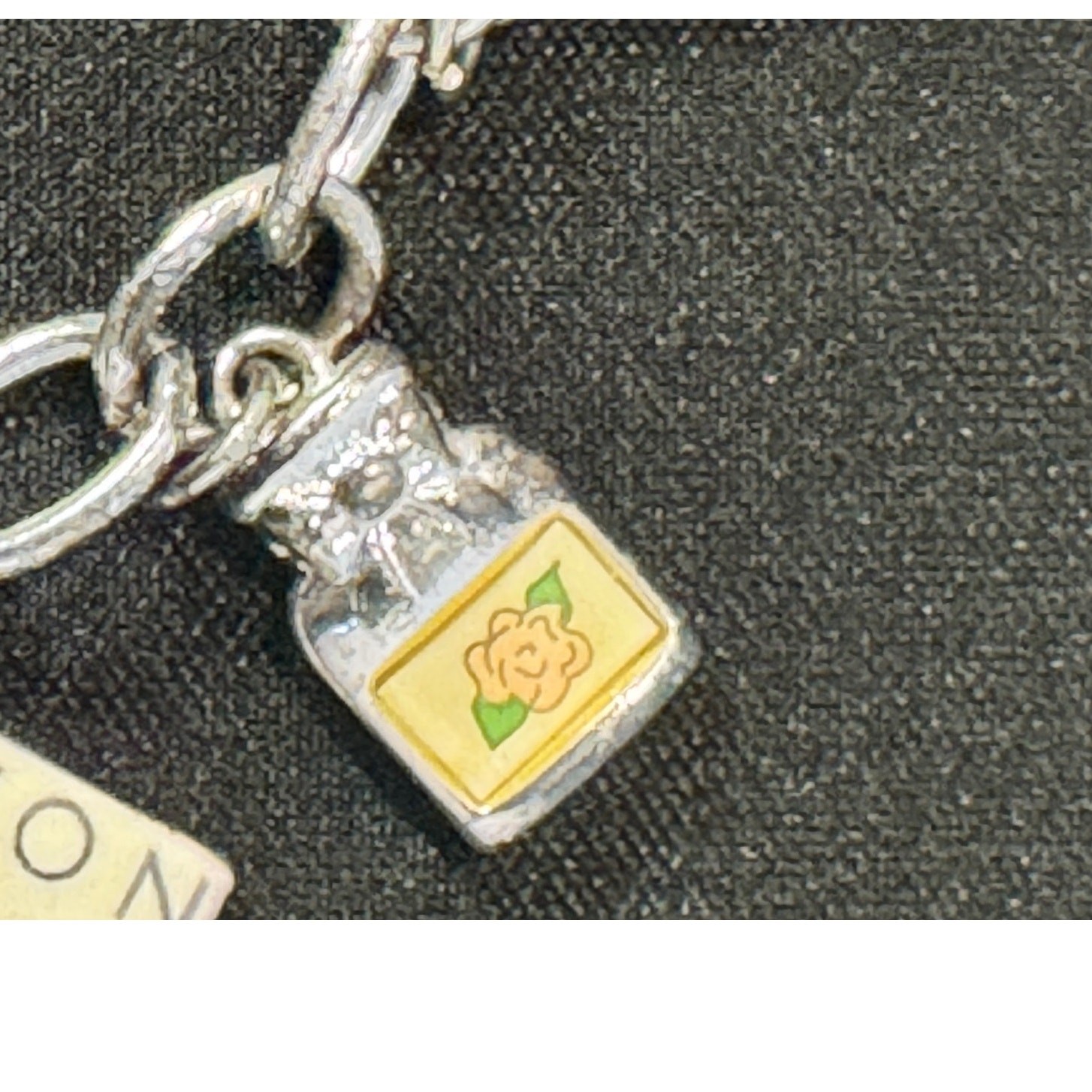 Avon 125th Anniversary 12 Charms 8.5” Charm Bracelet Pre-owned