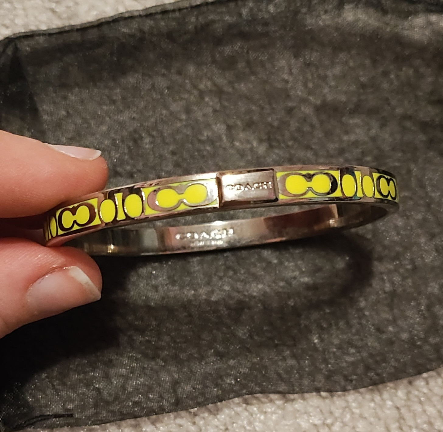 Coach Signature Silver And Yellow/Green Bangle Bracelet