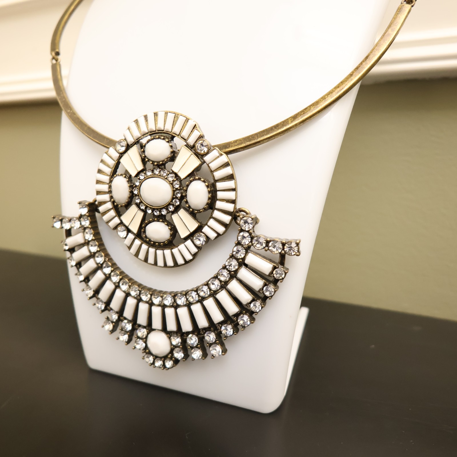 Logo Links necklace Lori Goldstein ivory crystals statement collar bronzetone