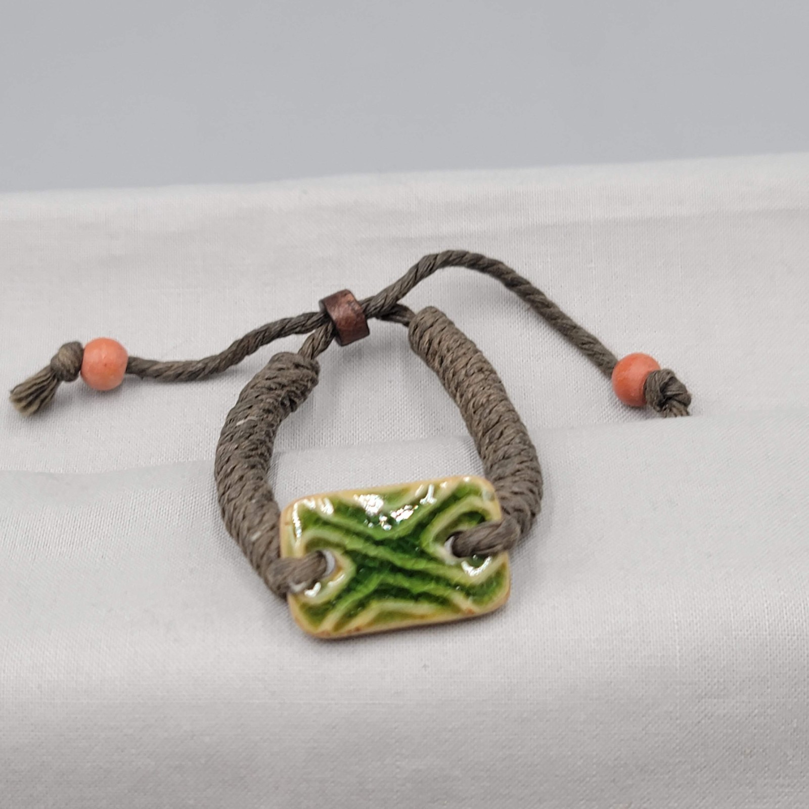 Green Art Pottery Bracelet Slide Adjustable Brown Cord Wood Bead
