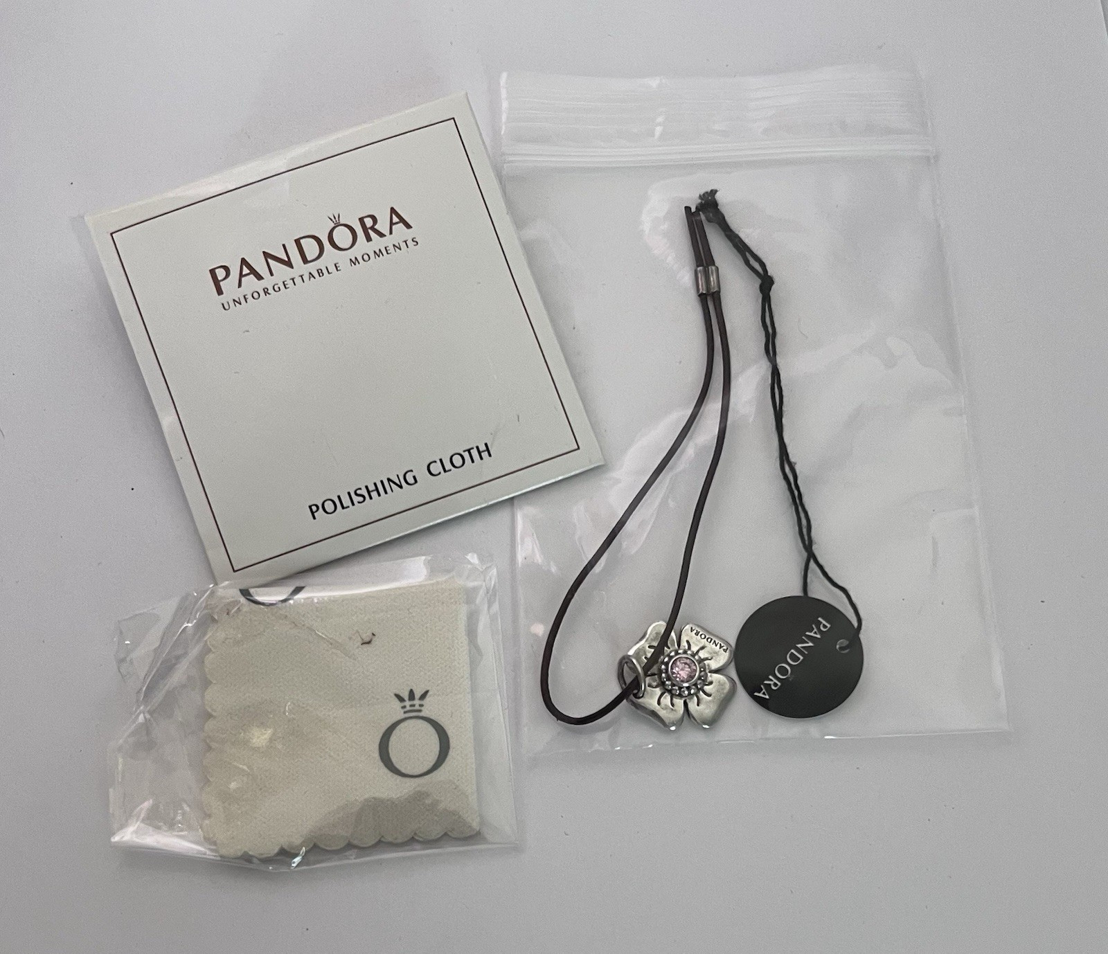 Authentic PANDORA Clasp Opener Pink CZ S925 Sterling Silver and Polishing Cloth