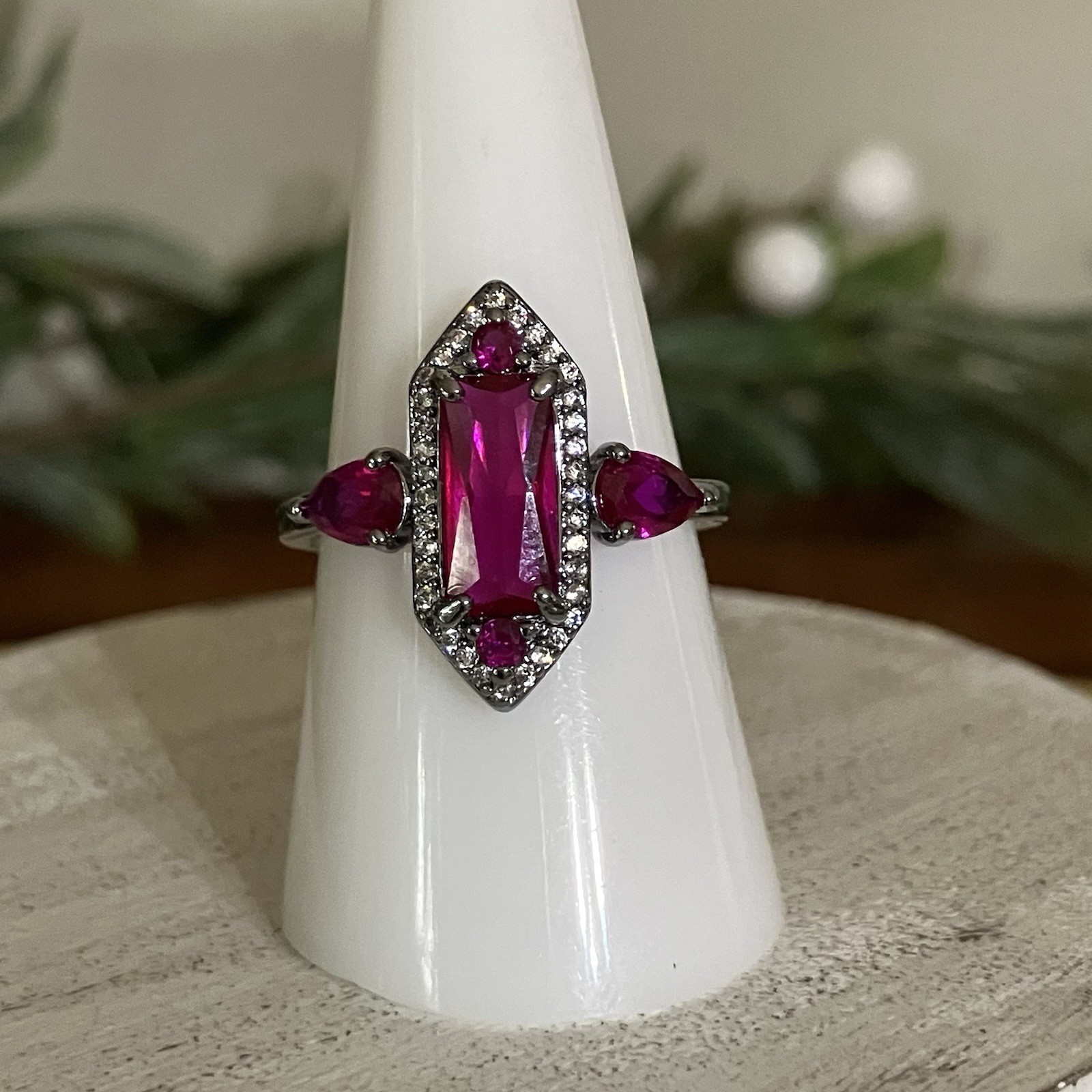Bomb Party “The Calliope Ring” Lab Ruby Hematite Plating July 2026 RG43302 Sz 9