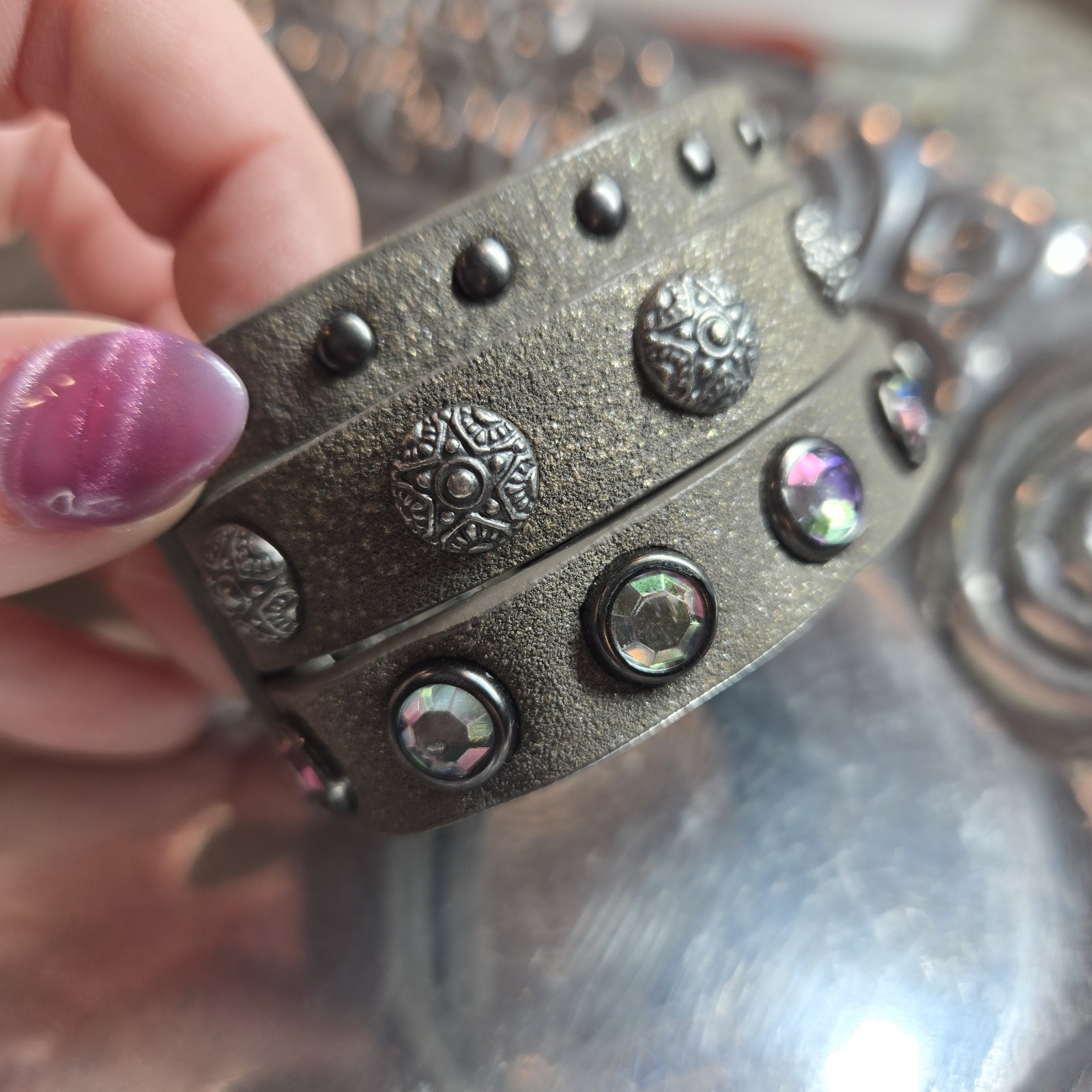 Rhinestone Studded Metal Leather Triple Band Cuff. Snap closure with 2 fittings