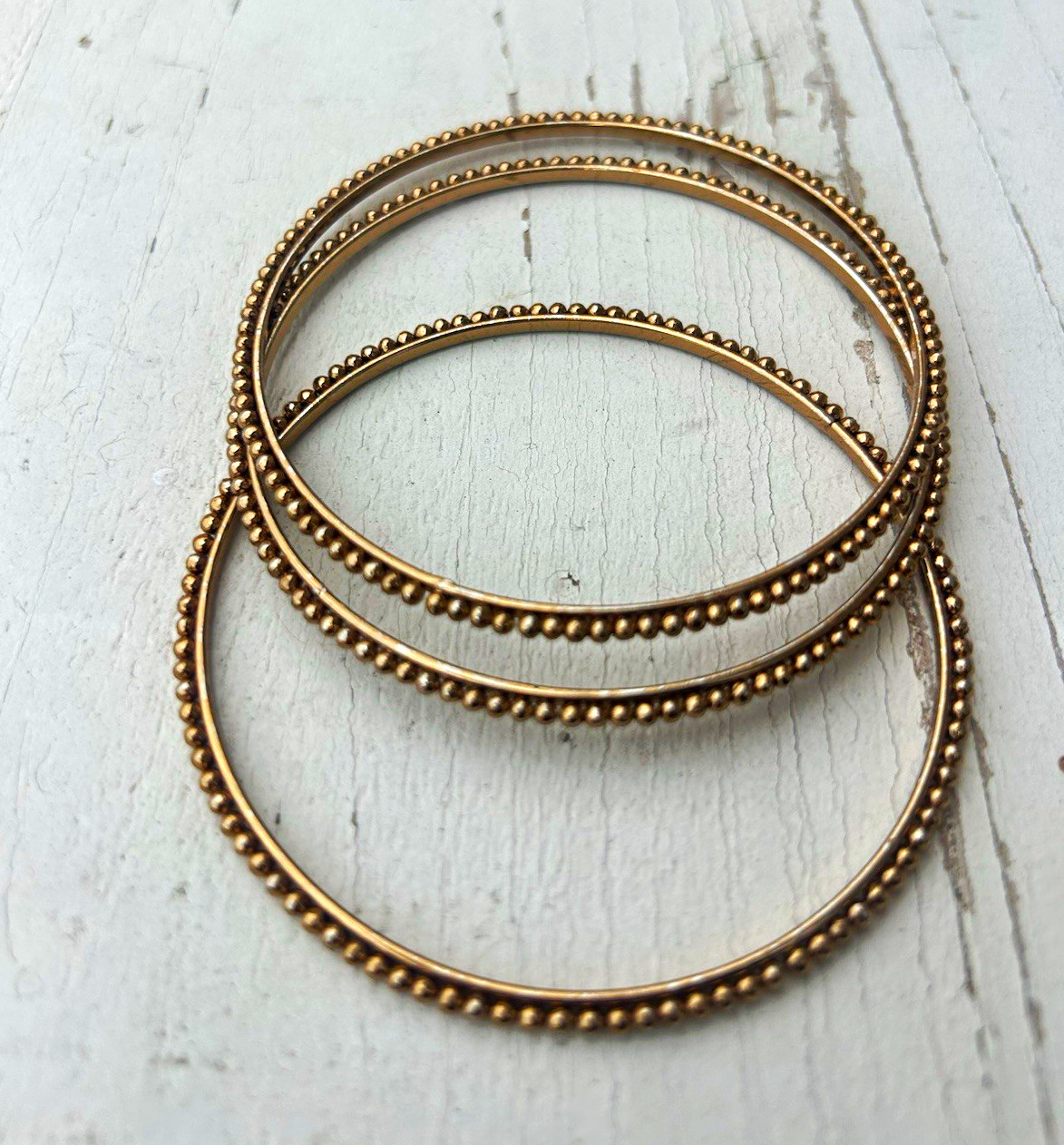 Set of 3 Gold Tone Metal Beaded Edge Round Bangle Bracelets, No Stone