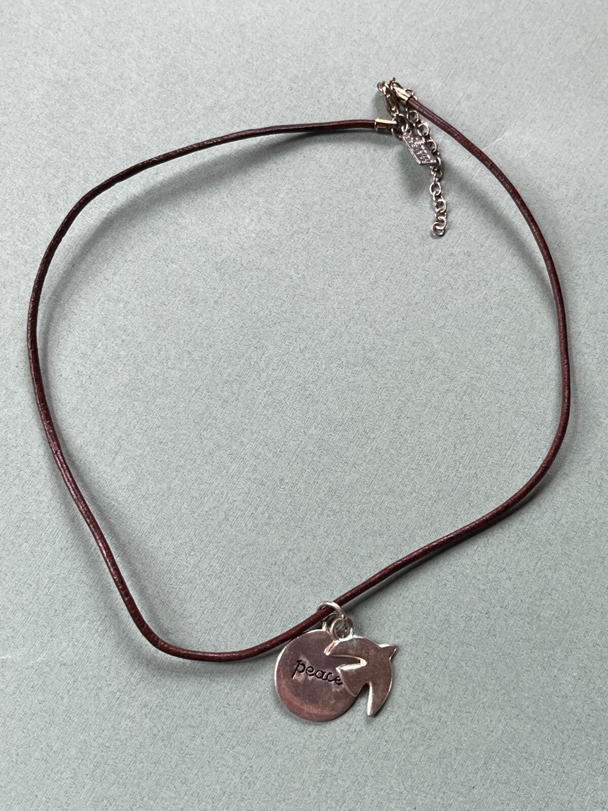 Baroni Designs Signed Brown Leather Cord w Silvertone Peace Disk & Dove Pendant