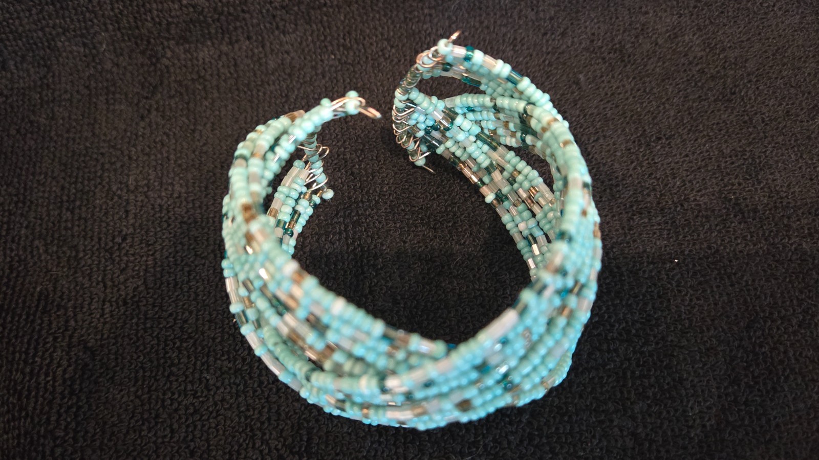 Sky Aqua beaded stretchable, good condition