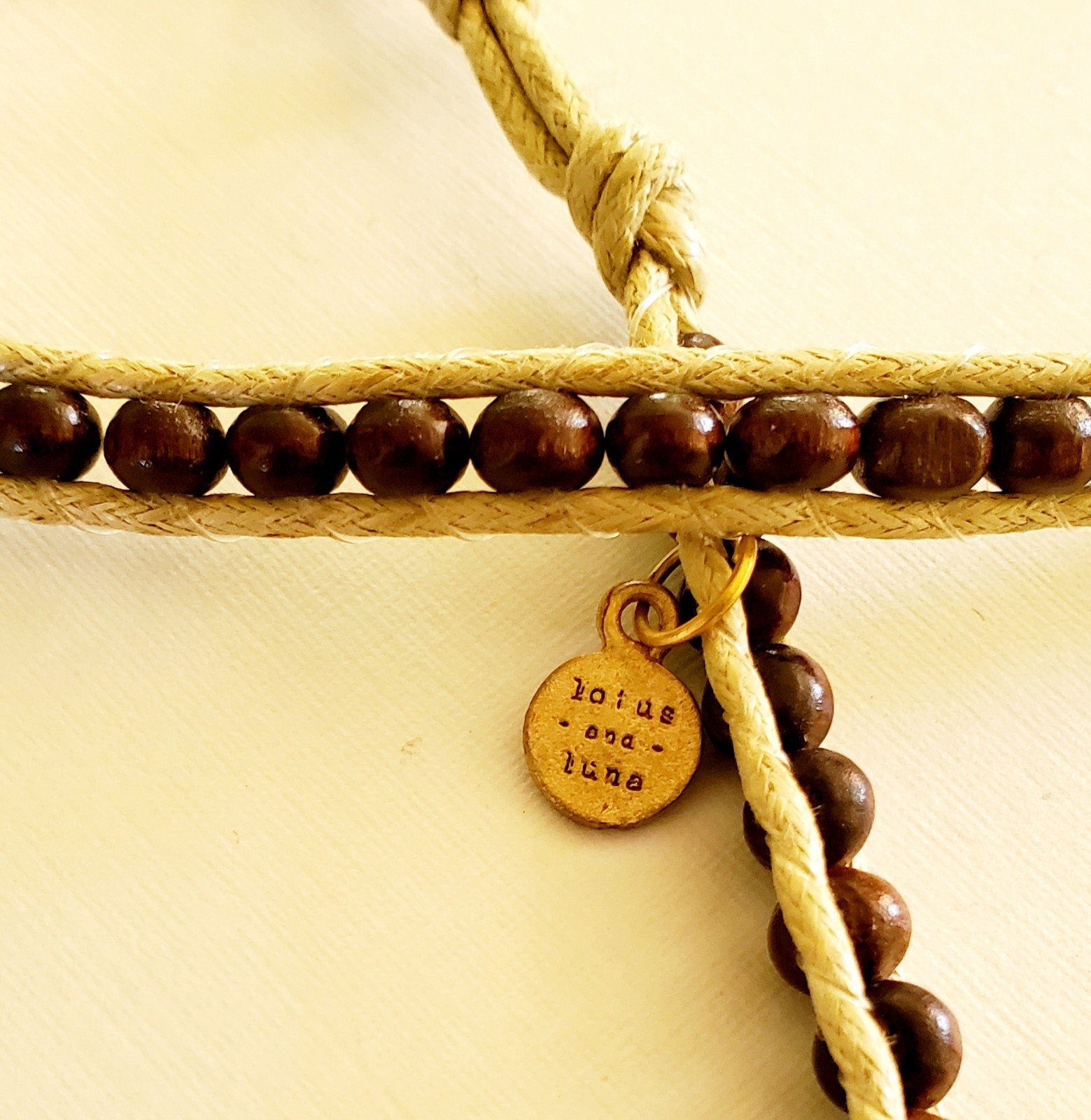 Lotus & Luna 21 inch string & bead necklace. Brown with turquoise accent beads.