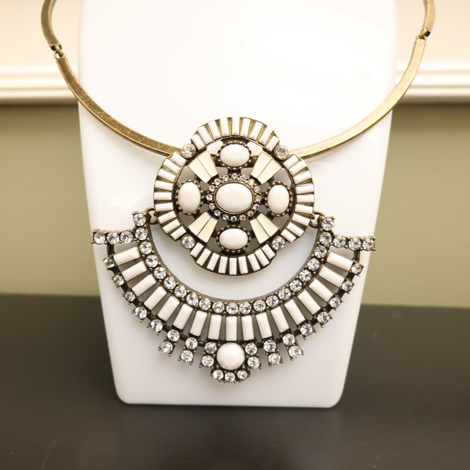 Logo Links necklace Lori Goldstein ivory crystals statement collar bronzetone
