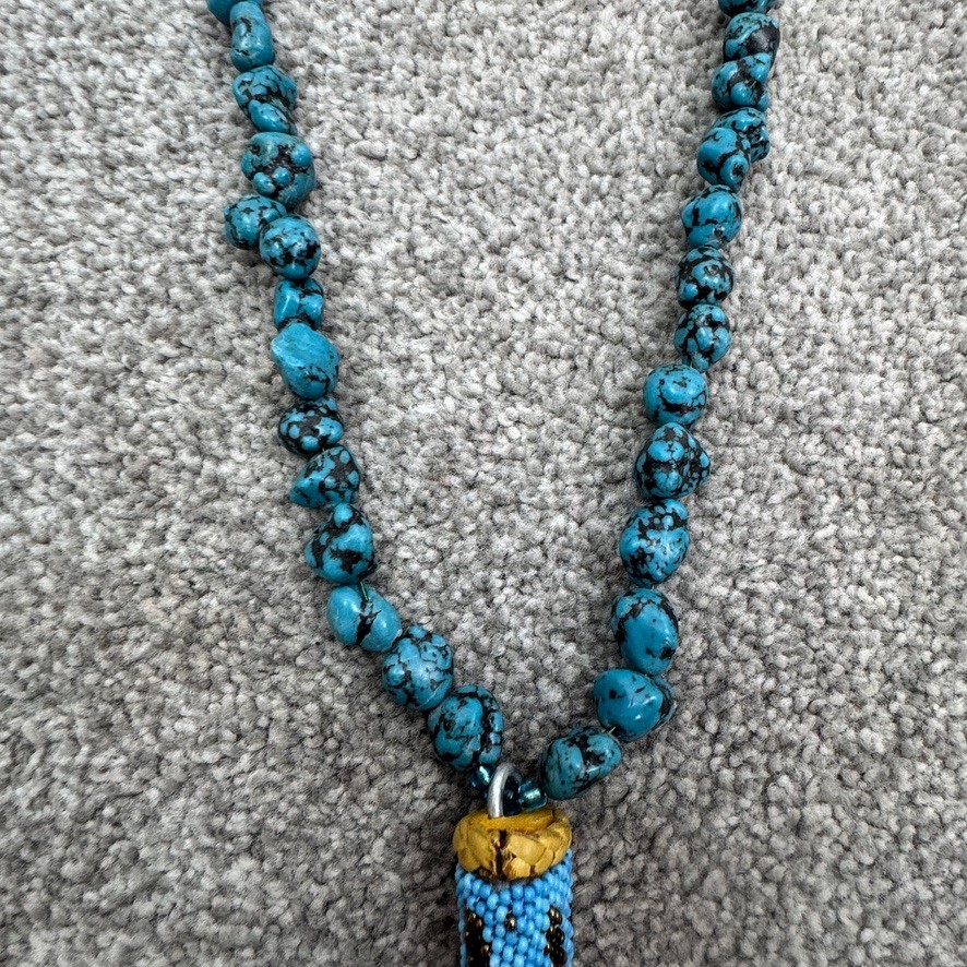 Handmade Necklace With Bone Pendant Wrapped In Beading On Blue Speckled Stones