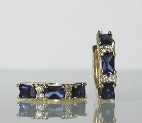 6 Sapphire and 8 C Z Huggie Earrings mounted in 100 mils of 18kt Yellow Gold
