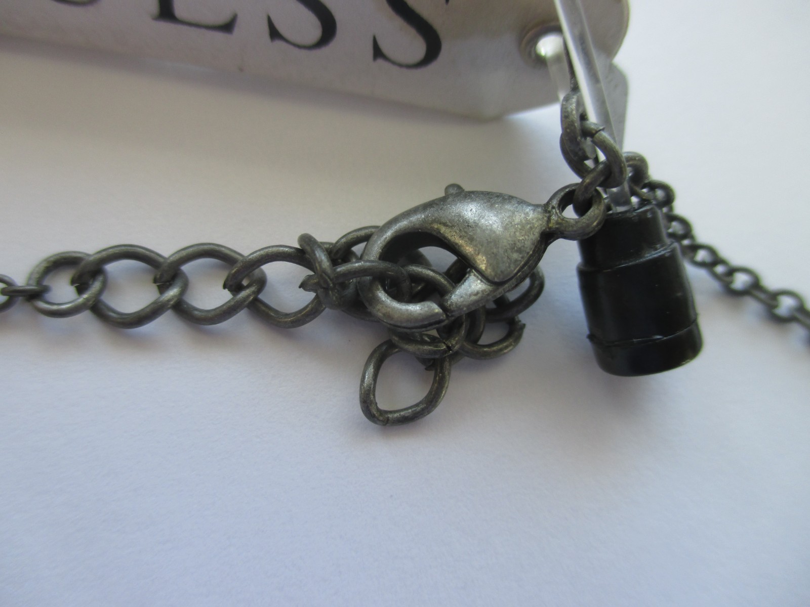 GUESS Silver Tone, Dark, Triangle Shape Necklace, New with Tag, 10 in. Chain