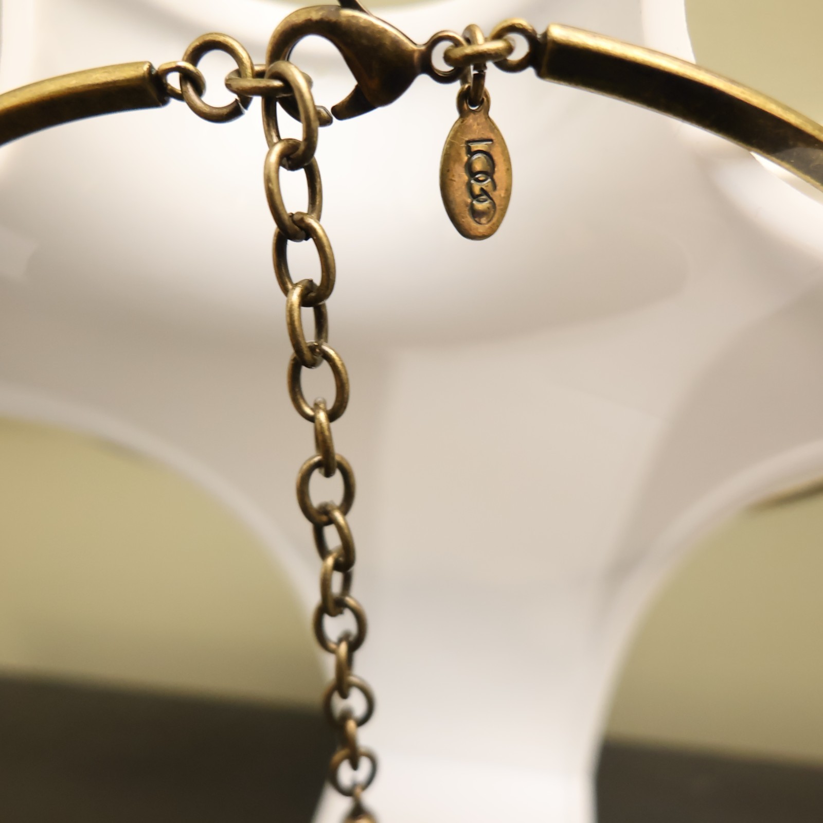 Logo Links necklace Lori Goldstein ivory crystals statement collar bronzetone