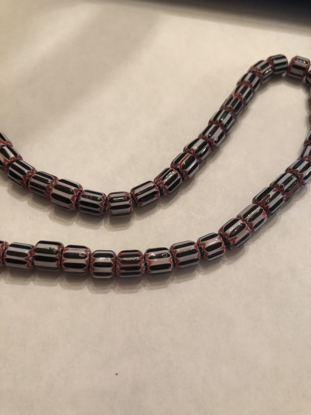 Vintage Red, White & Black Six Layer Glass Chevron Barrel Bead Strand