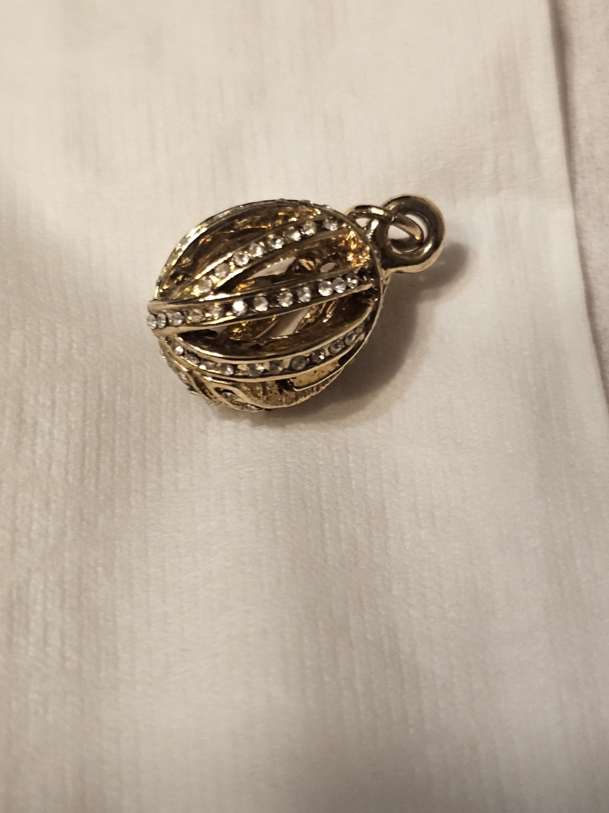 Christian Dior charm gold tone egg charm with rhinestones