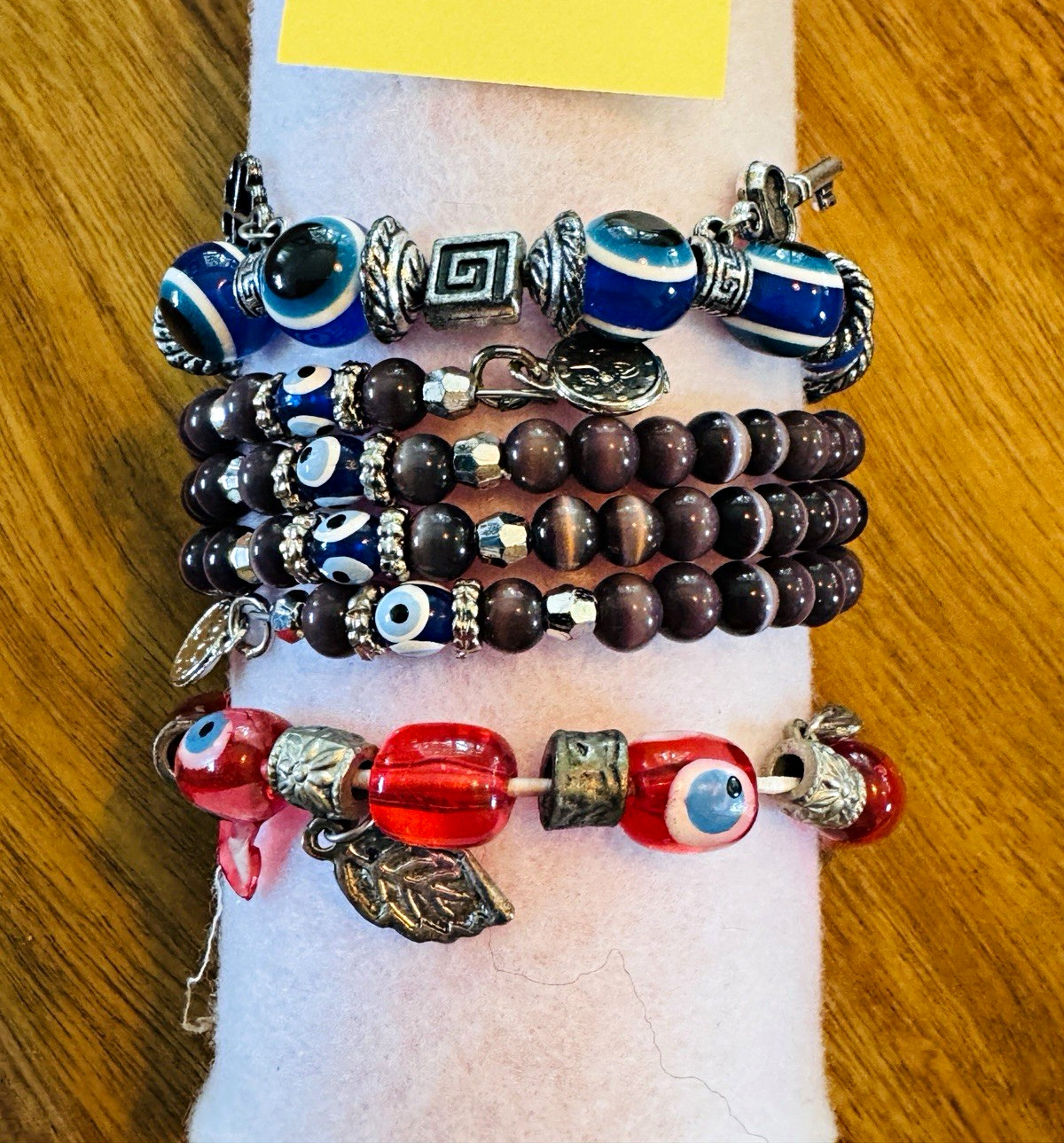 Lot of 27 Multicolor Glass Beaded Stretch Stackable Bracelets w/ Evil Eye Charms