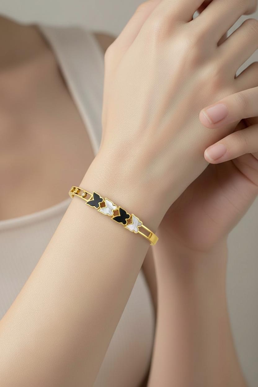 Exquisite Geometric Black and White Butterfly-Accented Stainless Steel Bracelet