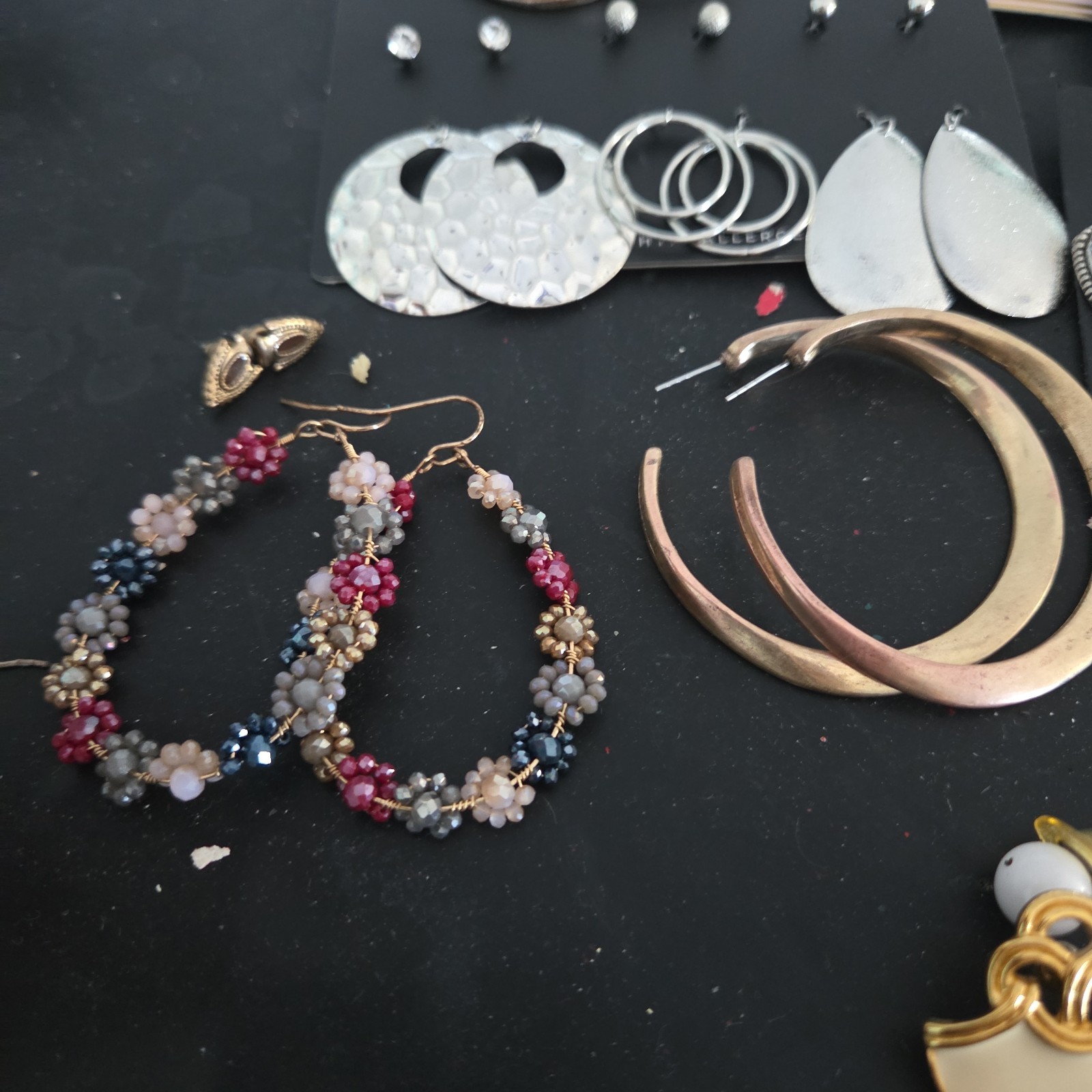 Lot of New & Used Earrings . Mixed colors and models.
