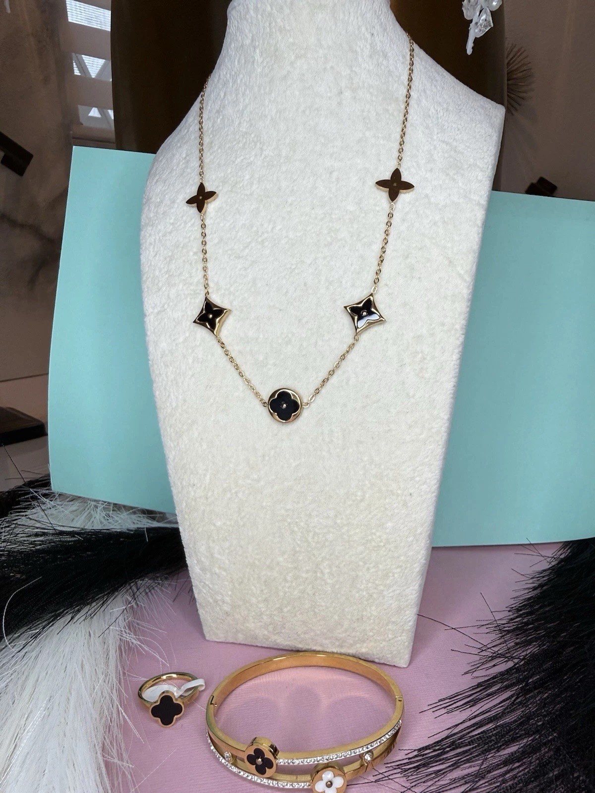 Gold Tone Clover Pendant Cable Chain Necklace with Black Accents
