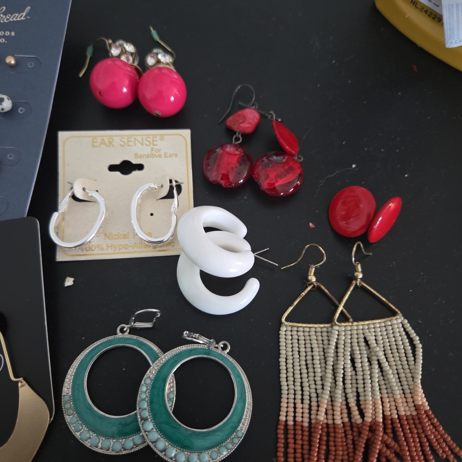 Lot of New & Used Earrings . Mixed colors and models.