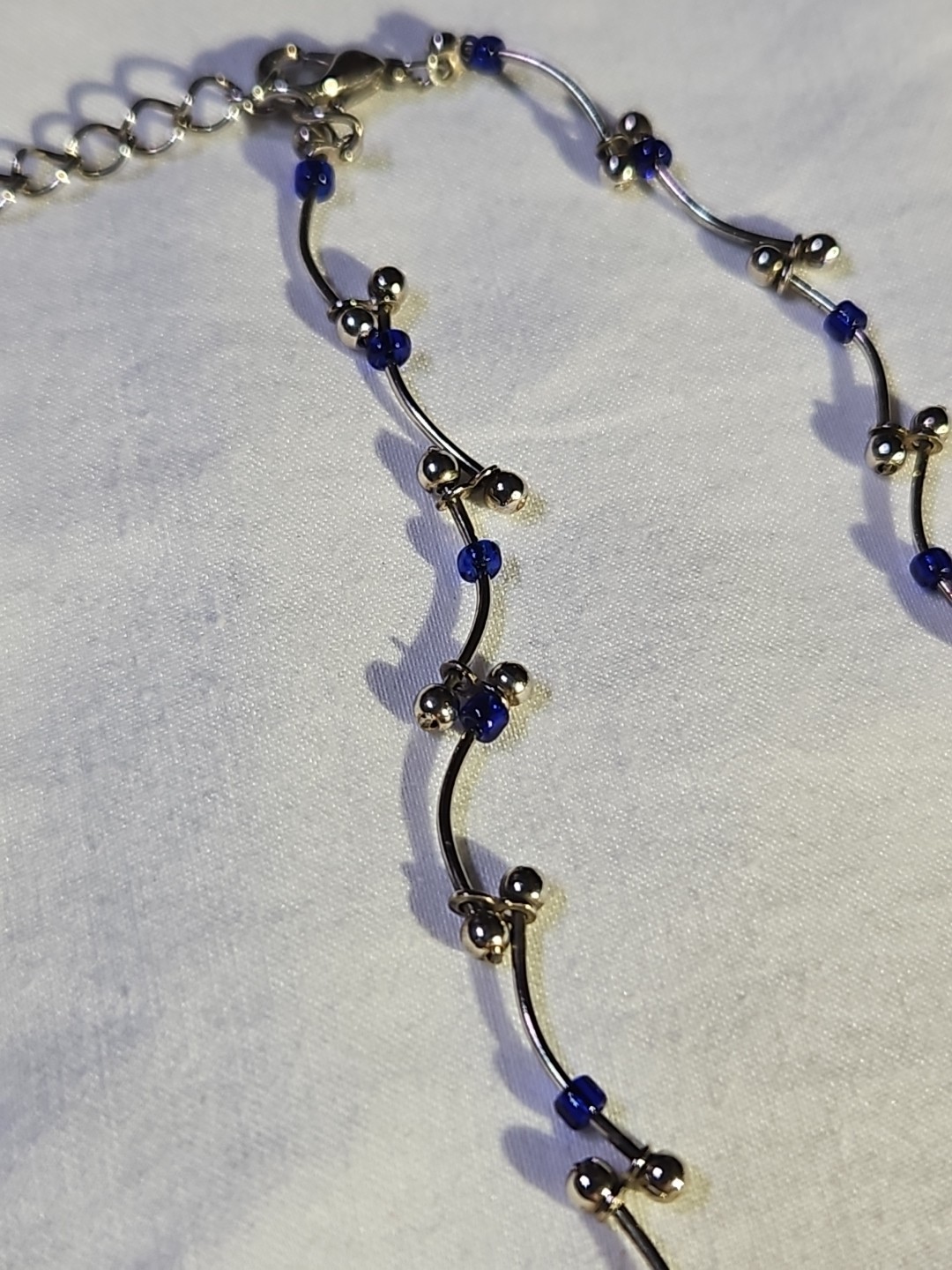 Silver Tone Vine Link Bar And Ball Necklace With Blue Beads. Measures 16Inches