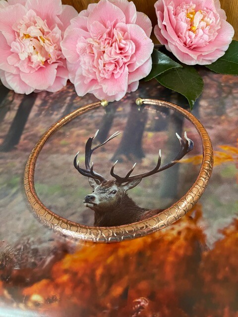 Solid copper choker #1200BL -3/8 of an inch wide. Accented with Brass tips.