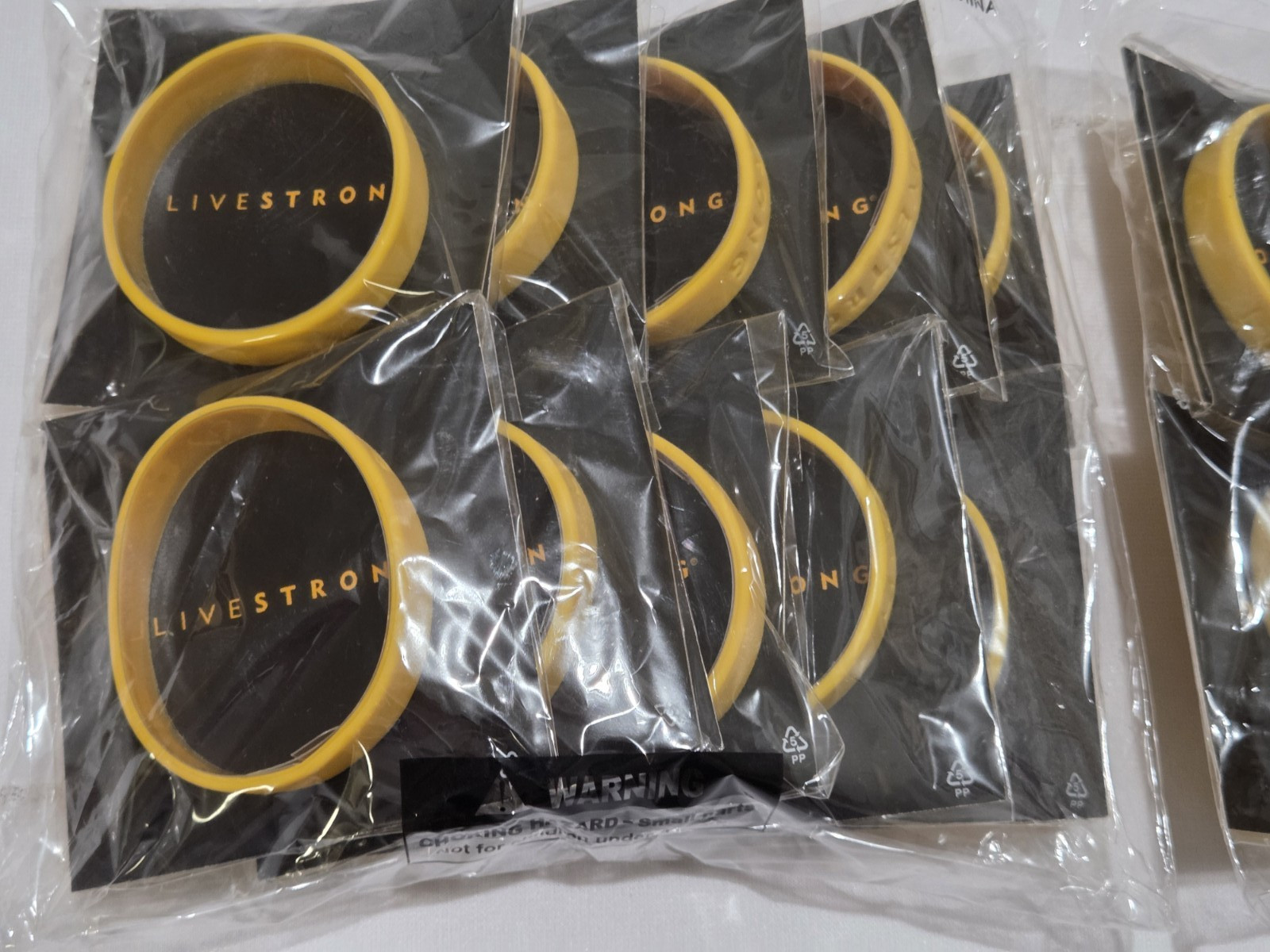 Lot of 20 – Nike Livestrong Bracelet – NEW – (Size XS – M) 7″/180 mm – XS – M