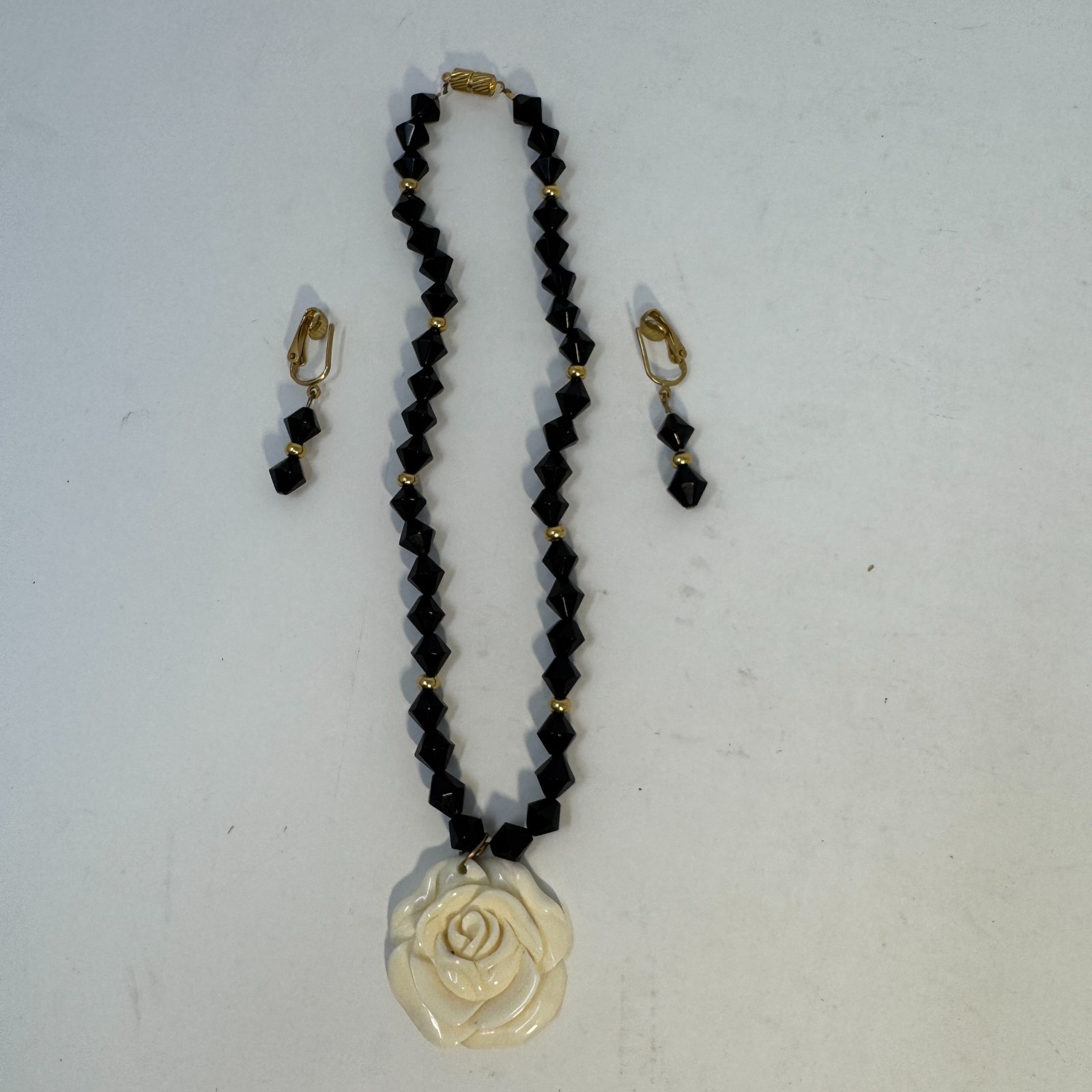 Vintage 60s Black Bicone Bead Necklace Ivory White Carved Resin Rose Pendant Set