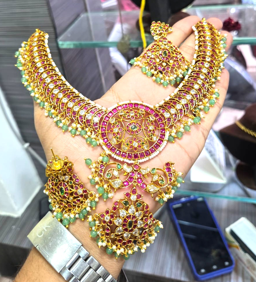 premium Kempu necklace set featuring traditional ruby stones and emerald beads