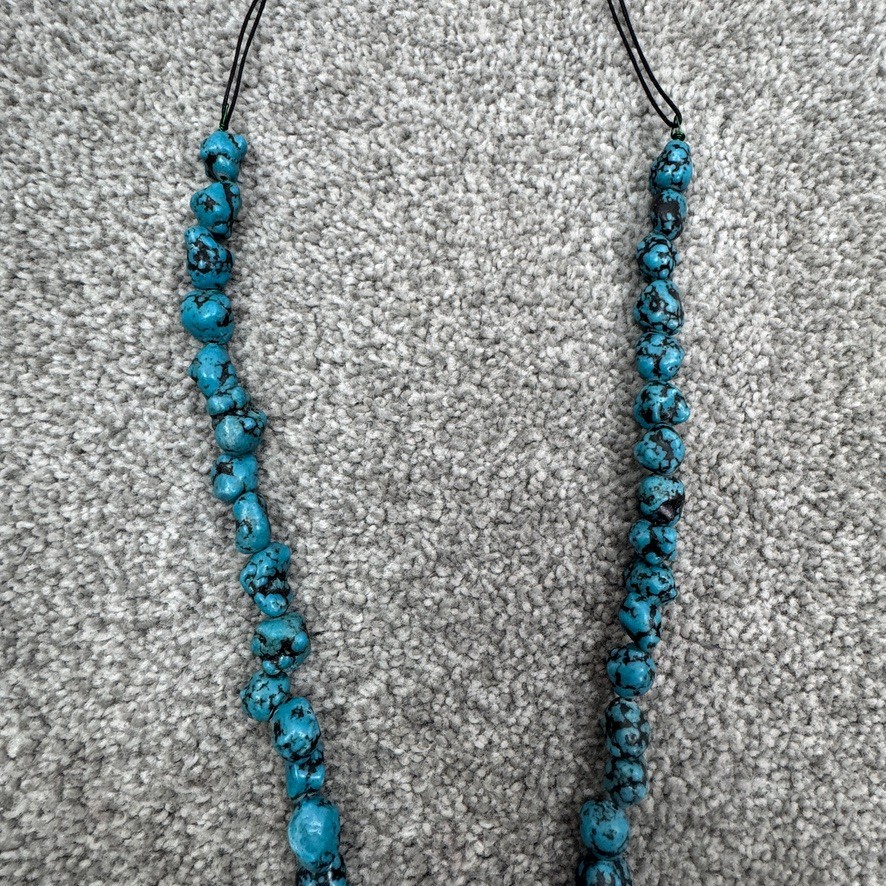 Handmade Necklace With Bone Pendant Wrapped In Beading On Blue Speckled Stones