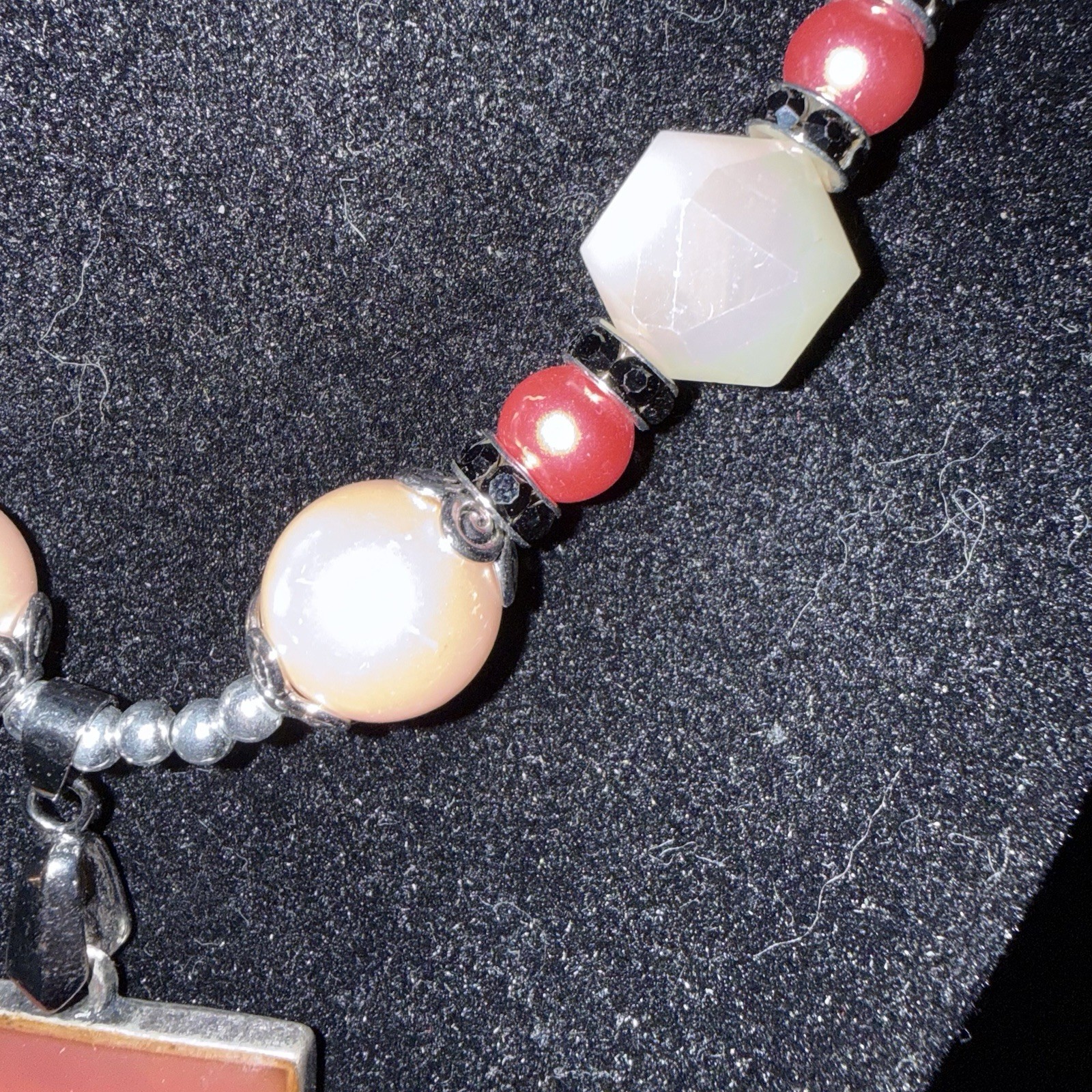 Silver tone red & white beaded necklace w/ orange rectangle charm, adjustable