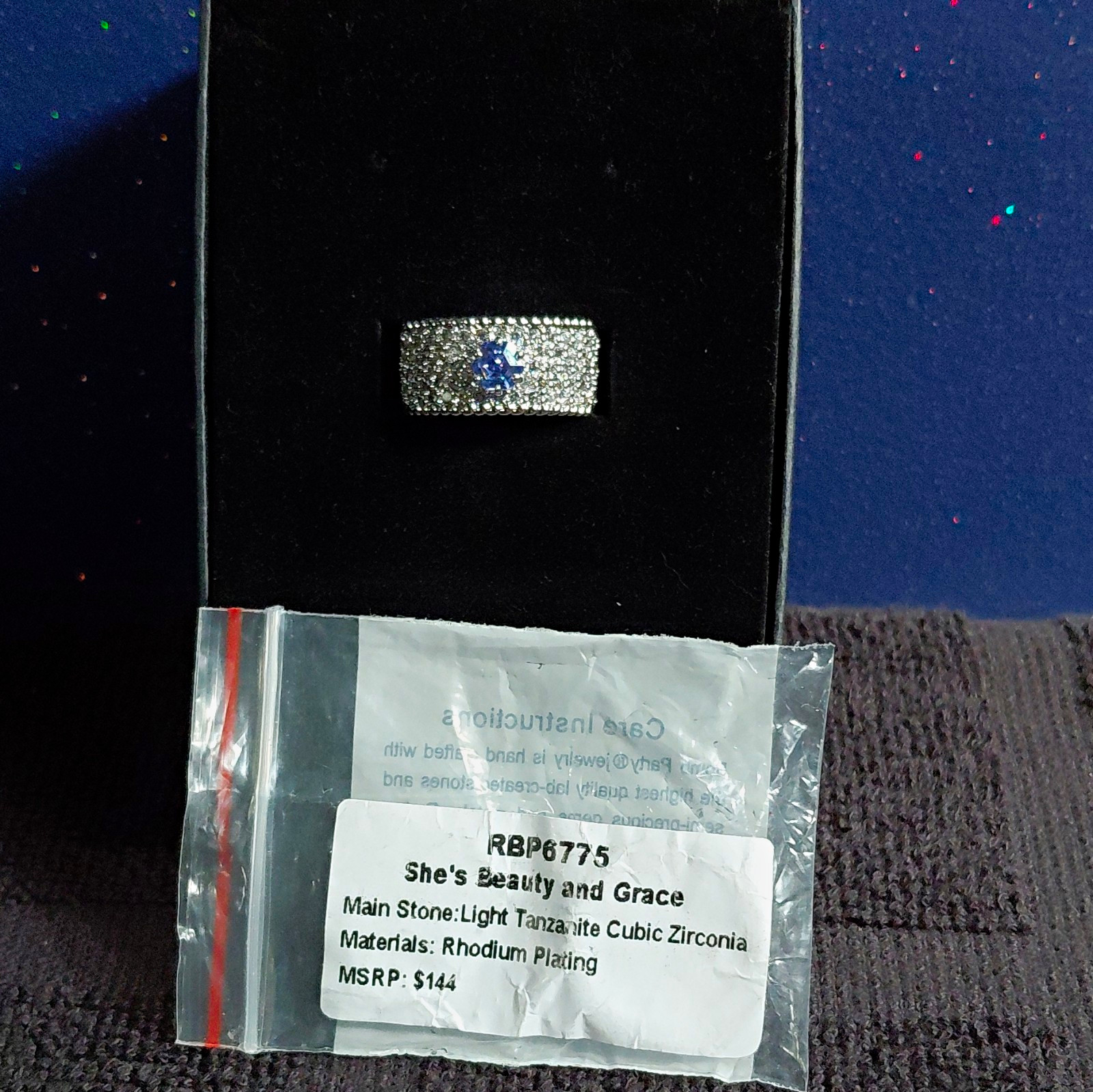 SHE’S BEAUTY AND GRACE- Rhodium CZ Pavé Band- BP-size 9- Dec Birthday 2023